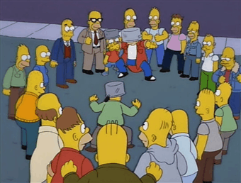 Simpsons "pot fight" Gigif, where two of Homer's relatives have a pot on their heads and run into each other hitting themselves with them, all while surrounded by a circle of Simpson relatives