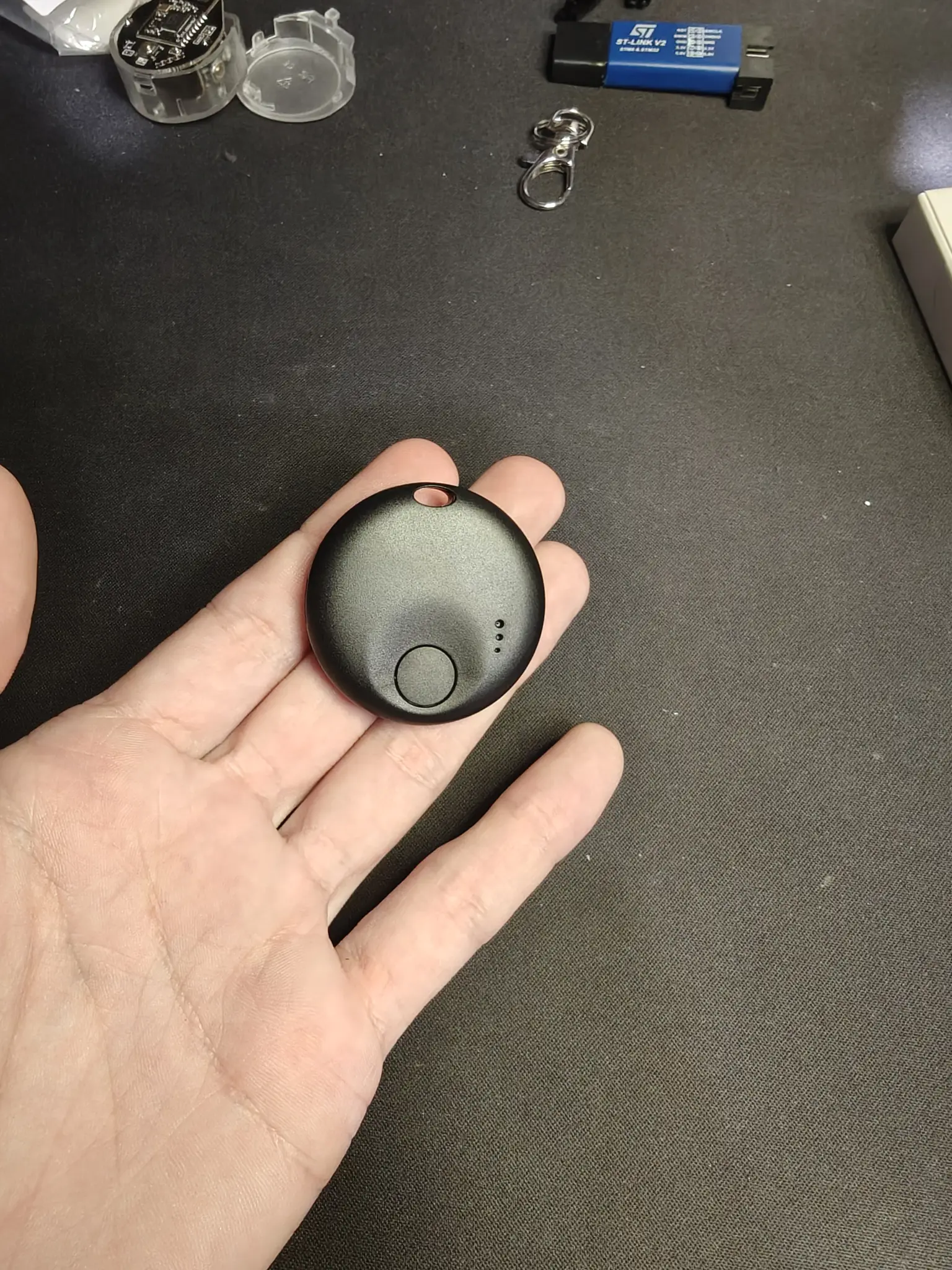 larger but flatter case with a button and some leds