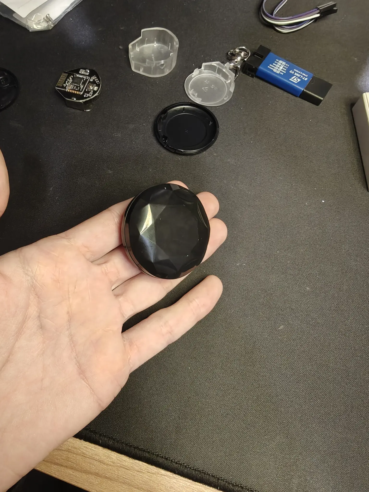the chip in a big bulky black round case, in my hand