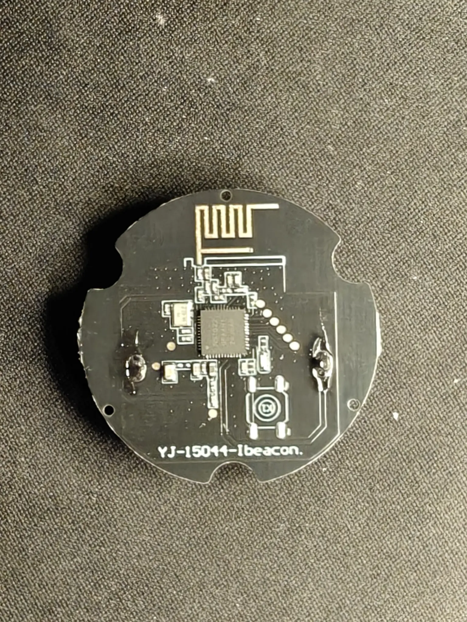 big black PCB with a chip in the middle, marking "N51822" barely visible