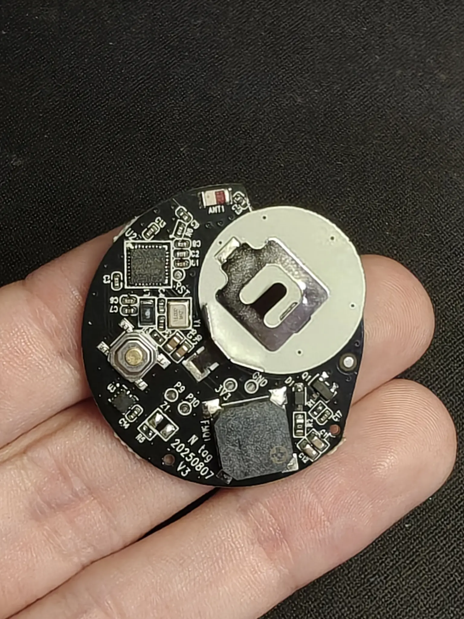 larger black PCB with a lot more components in it